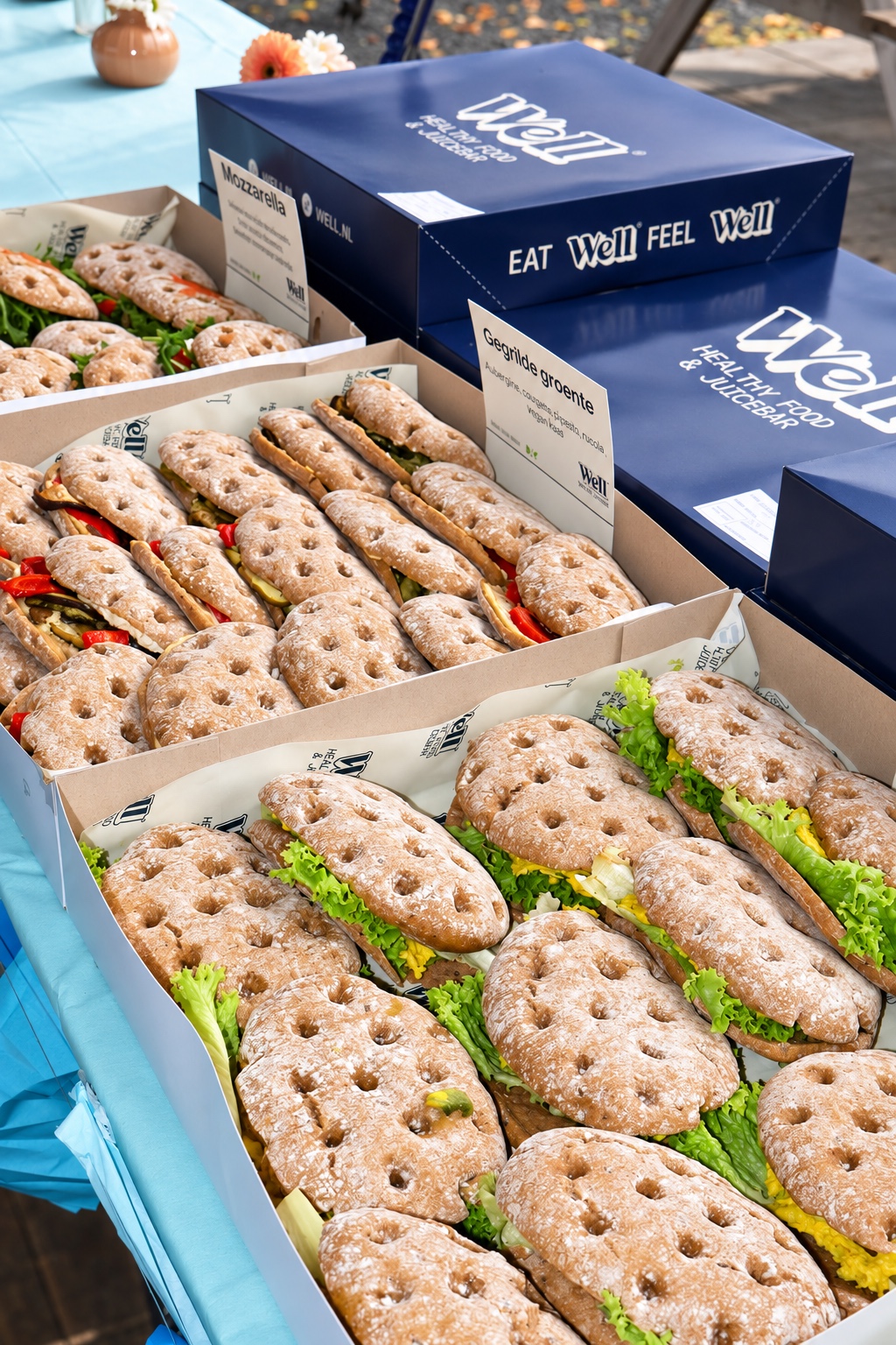 Freshly filled sandwiches in Well’s blue catering boxes